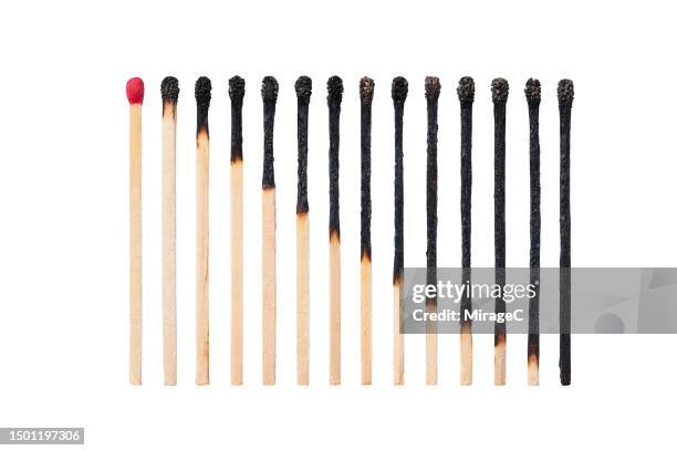 a set of matches burning out isolated on white - マッチ棒 ストックフォトと画像