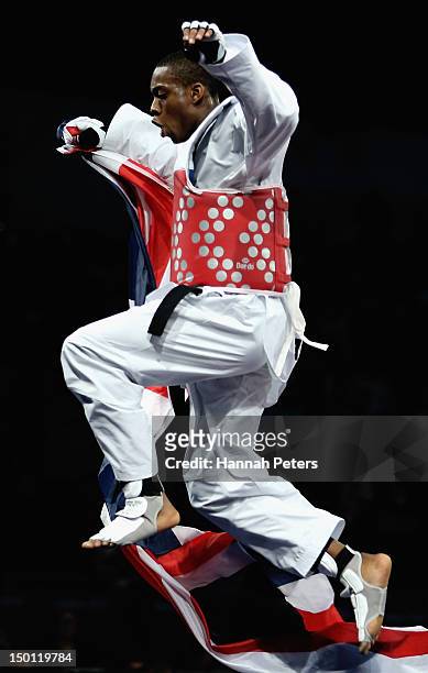 Lutalo Muhammad of Great Britain celebrates winning the Bronze medal in the Men's -80kg Taekwondo Bronze Medal Finals bout against Arman Yeremyan of...