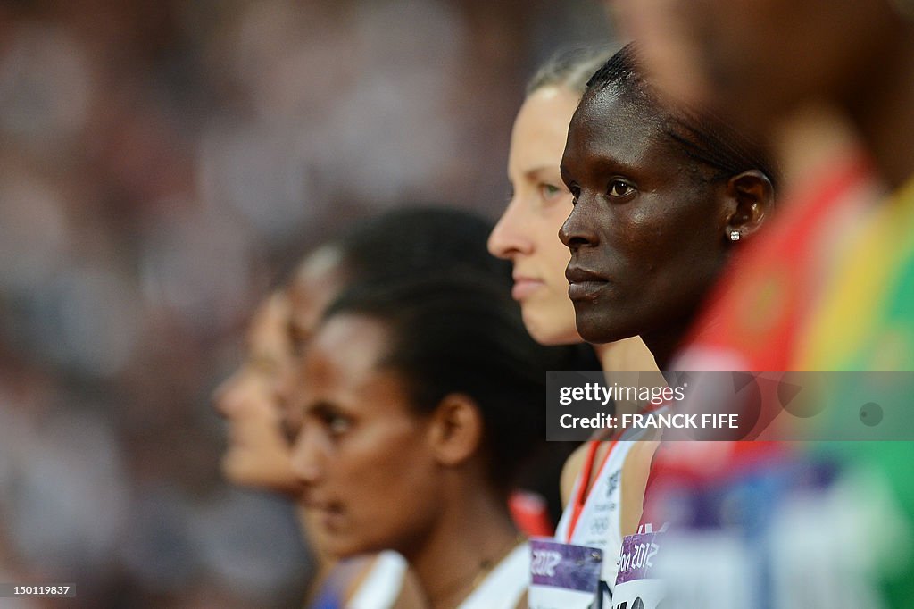 Kenya's Sally Jepkosgei Kipyego (R) conc