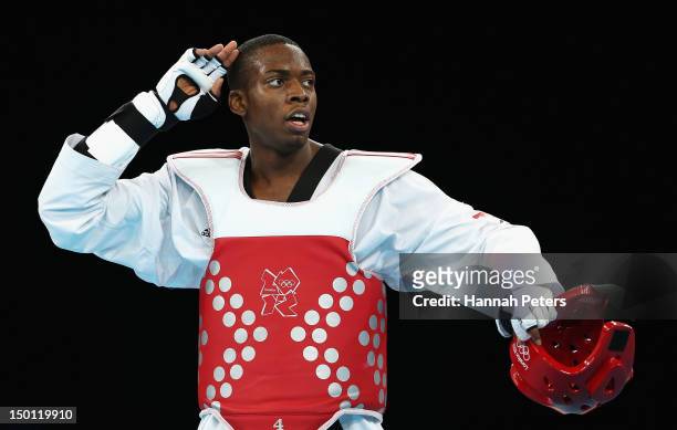 Lutalo Muhammad of Great Britain celebrates winning the Bronze medal in the Men's -80kg Taekwondo Bronze Medal Finals bout against Arman Yeremyan of...