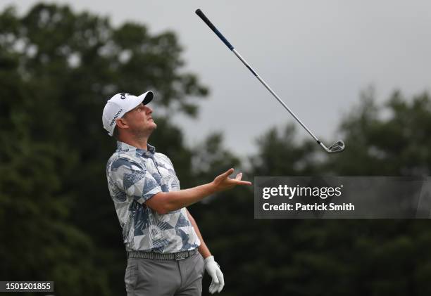 Emiliano Grillo of Argentina reacts to his tee shot on the fifth hole during the third round of the Travelers Championship at TPC River Highlands on...