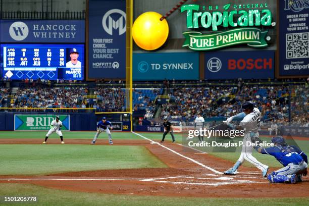 Wander Franco of the Tampa Bay Rays hits a rbi single against the Kansas City Royals during the second inning at Tropicana Field on June 24, 2023 in...