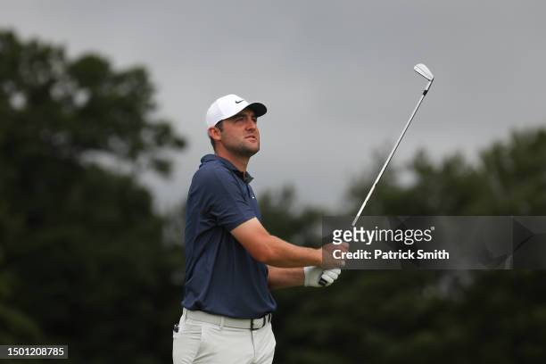Scottie Scheffler of the United States plays his shot from the fifth tee during the third round of the Travelers Championship at TPC River Highlands...