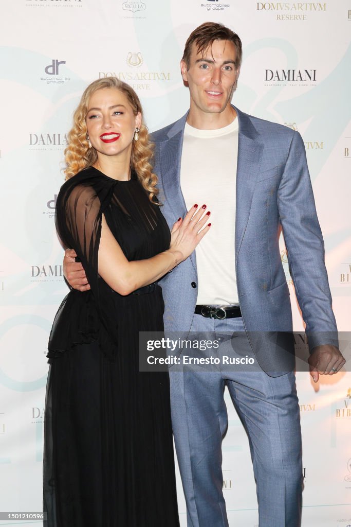 Amber Heard and Conor Allyn attend the 69th Taormina Film Festival on