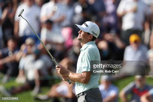 Keegan Bradley of the United States reacts to a missed putt for birdie on the 17th green during the third round of the Travelers Championship at TPC...
