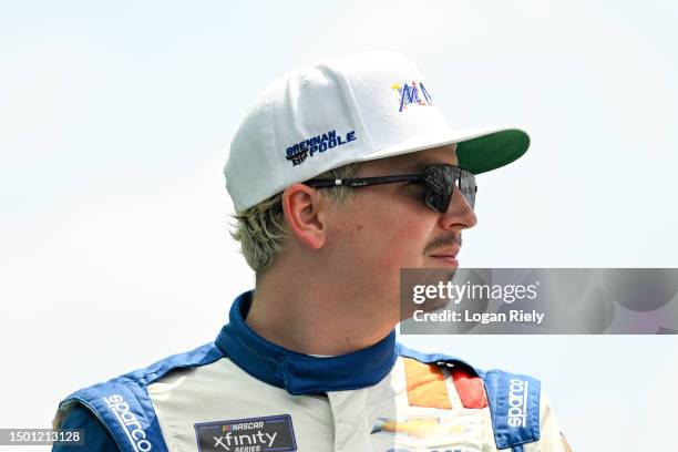 Brennan Poole, driver of the Macc Door Systems Chevrolet, walks onstage during driver intros prior to the NASCAR Xfinity Series Tennessee Lottery 250...