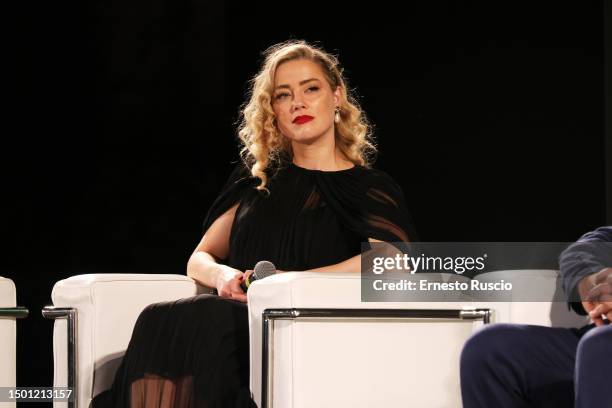 Amber Heard speaks on the stage during the 69th Taormina Film Festival on June 24, 2023 in Taormina, Italy.
