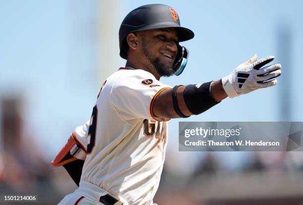 Luis Matos of the San Francisco Giants celebrates while trotting around the bases after hitting his first MLB home run, a two-run home run in the...