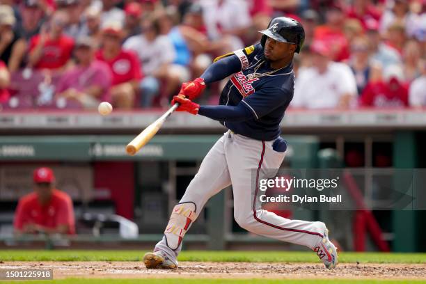 Ozzie Albies of the Atlanta Braves hits a home run in the third inning of the game against the Cincinnati Reds at Great American Ball Park on June...