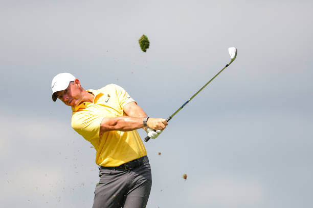 Rory McIlroy of Northern Ireland plays a second shot on the 14th hole during the third round of the Travelers Championship at TPC River Highlands on...