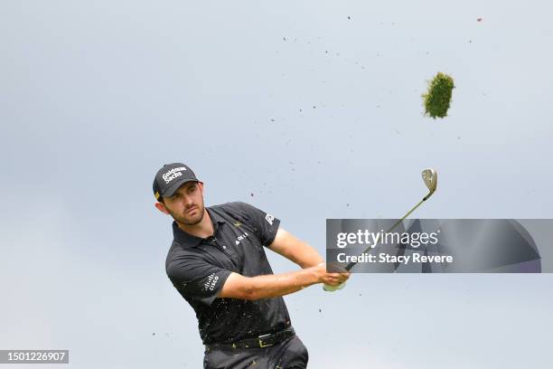 Patrick Cantlay of the United States plays a second shot on the 14th hole during the third round of the Travelers Championship at TPC River Highlands...