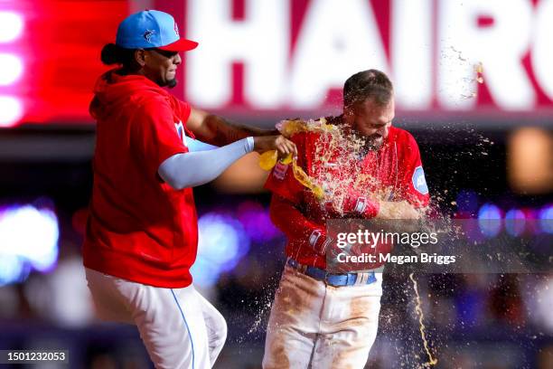 Jon Berti of the Miami Marlins celebrates after hitting a walk off RBI single to defeat the Pittsburgh Pirates during the eleventh inning at...