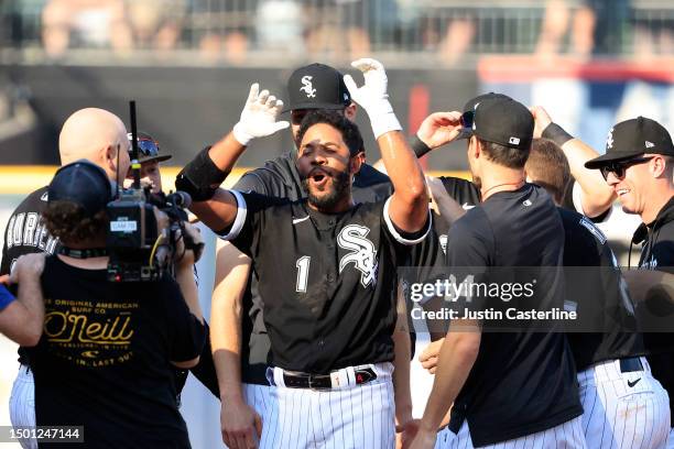 Elvis Andrus of the Chicago White Sox celebrates with his team after a walk off single in the ninth inning in the game in the game against the Boston...