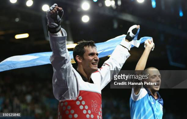 Sebastian Eduardo Crismanich of Argentina celebrates winning the Gold medal in the Men's -80kg Taekwondo Gold Medal Final against Nicolas Garcia...