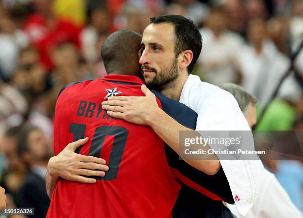 Kobe Bryant of United States and Manu Ginobili of Argentina hug after the United States defeats Argentina 109-83 during the Men's Basketball...