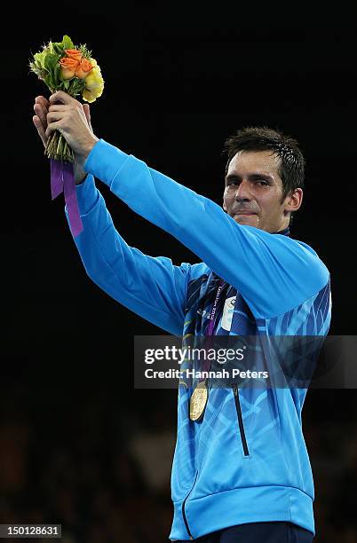 Gold medallist Sebastian Eduardo Crismanich of Argentina celebrates during the medal ceremony in the Men's -80kg Taekwondo on Day 14 of the London...