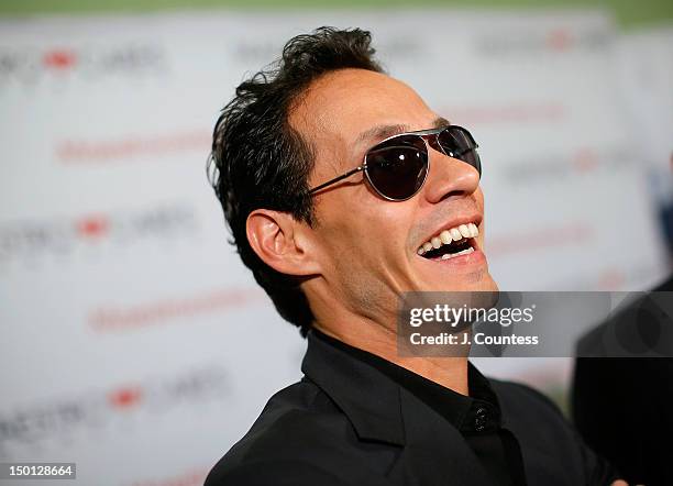 Singer Marc Anthony speaks to the media during the Maestro Cares Foundation Benefit at El Museo Del Barrio on August 9, 2012 in New York City.