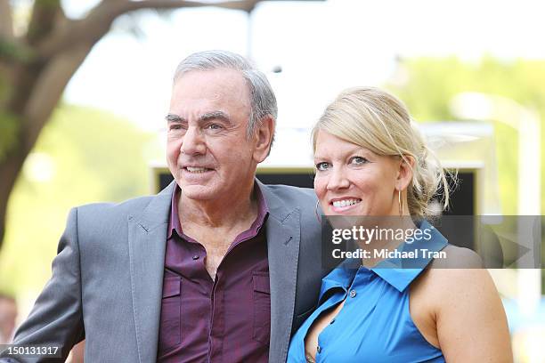 Musician Neil Diamond and wife, Katie McNeil attend the ceremony honoring him with a Star on The Hollywood Walk of Fame held in front of the famed...