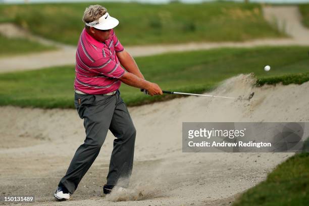 Carl Pettersson of Sweden hits out of the sand during Round Two of the 94th PGA Championship at the Ocean Course on August 10, 2012 in Kiawah Island,...