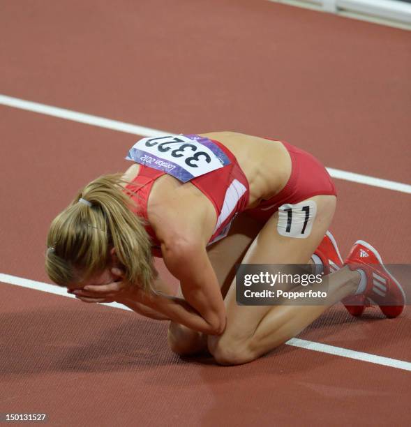 Morgan Uceny of the United States reacts after falling during the Women's 1500m Final on Day 14 of the London 2012 Olympic Games at Olympic Stadium...