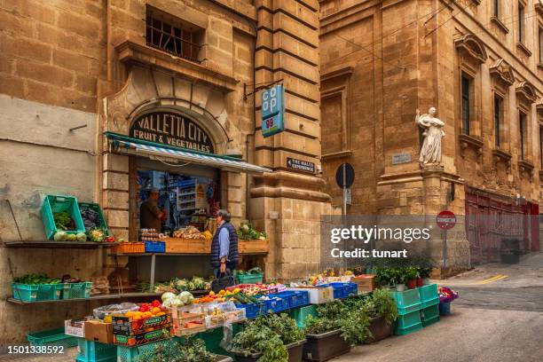 fruit and vegetable store in valletta, malta - malta business stock pictures, royalty-free photos & images