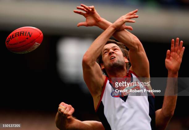 Jared Rivers of the Demons fleis for a mark during the round 20 AFL match between the St Kilda Saints and the Melbourne Demons at the Melbourne...