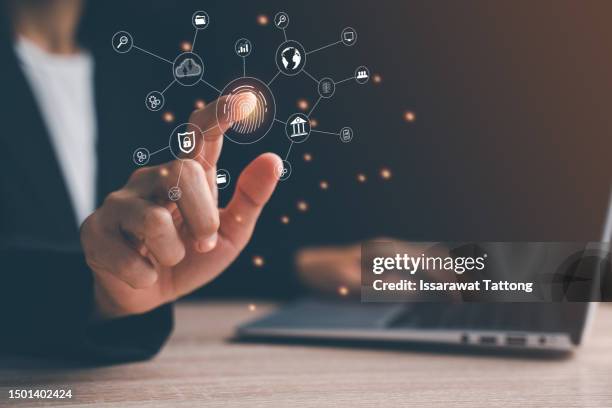 data protection and secure online payments. cyber internet security technologies and data encryption . closeup view of man`s hand using laptop with virtual digital screen with icon of lock on it. - security screen icons stock pictures, royalty-free photos & images