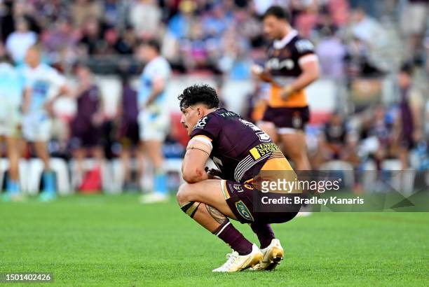 Kotoni Staggs of the Broncos looks dejected after his team loses the round 17 NRL match between Brisbane Broncos and Gold Coast Titans at Suncorp...