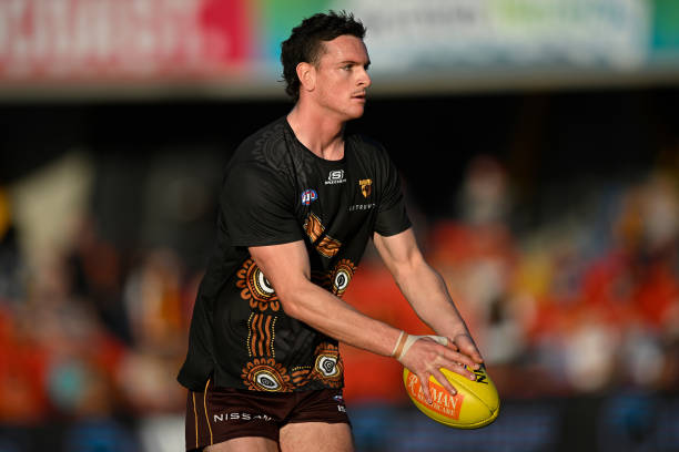 James Blanck of the Hawks of the Hawks warms up prior to the round 15 AFL match between Gold Coast Suns and Hawthorn Hawks at Heritage Bank Stadium,...