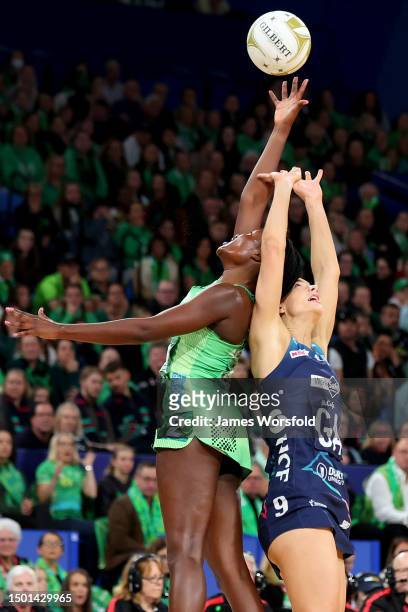 Sunday Aryang of the Fever and Kiera Austin of the vixens contest for the ball during the Super Netball Semifinal match between Melbourne Vixens and...