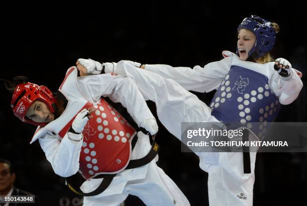 Russia's Anastasiia Baryshnikova fights against Tunisia's Khaoula Ben Hamza during their women's taekwondo bout in the + 67 kg category as part of...