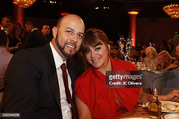 Singer Jenni Rivera and her husband Esteban Loaiza attend the 27th Annual Imagen Awards at The Beverly Hilton Hotel on August 10, 2012 in Beverly...