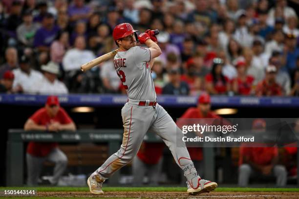 Hunter Renfroe of the Los Angeles Angels hits a 3-run double in the third inning of a game against the Colorado Rockies at Coors Field on June 24,...