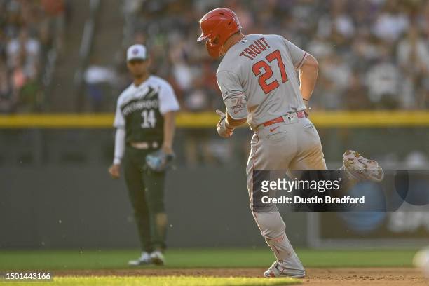 Mike Trout of the Los Angeles Angels rounds the bases after hitting a solo homerun in the third inning of a game against the Colorado Rockies at...