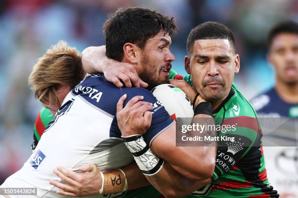 Jordan McLean of the Cowboys is tackled during the round 17 NRL match between South Sydney Rabbitohs and North Queensland Cowboys at Accor Stadium on...