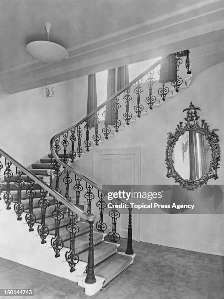 Staircase in Clarence House, the home of Princess Elizabeth and her husband, the Duke of Edinburgh, in London, 1949. This wing was added in 1875...