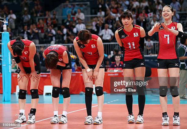 Erika Araki, Saori Kimura, Maiko Kano, Ai Otomo, and Kaori Inoue of Japan celebrates after defeating Korea to win their Women's Volleyball bronze...