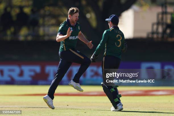 Barry McCarthy of Ireland celebrates with teammate Lorcan Tucker after dismissing Kusal Mendis of Sri Lanka by lbw during the ICC Men's Cricket World...