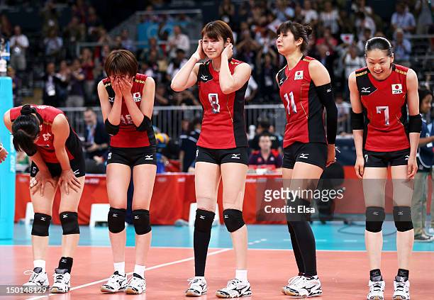 Erika Araki, Saori Kimura, Maiko Kano, Ai Otomo, and Kaori Inoue of Japan celebrates after defeating Korea to win their Women's Volleyball bronze...