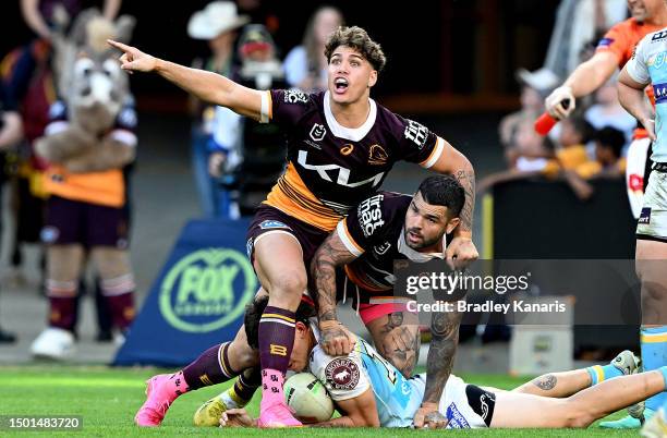 Reece Walsh of the Broncos disputes a call by the referee during the round 17 NRL match between Brisbane Broncos and Gold Coast Titans at Suncorp...