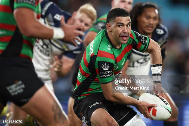 Cody Walker of the Rabbitohs runs with the ball during the round 17 NRL match between South Sydney Rabbitohs and North Queensland Cowboys at Accor...