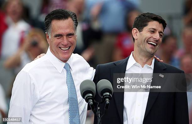 Republican presidential candidate, former Massachusetts Gov. Mitt Romney jokes with Rep. Paul Ryan after announcing him as the "next PRESIDENT of the...