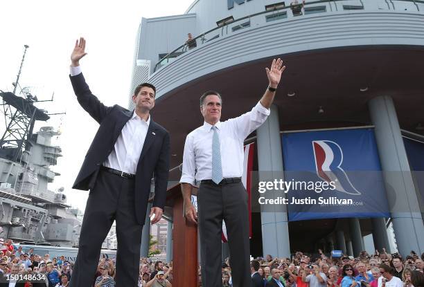 Republican presidential candidate, former Massachusetts Gov. Mitt Romney and U.S. Rep. Paul Ryan wave as Ryan is announced as his vice presidential...