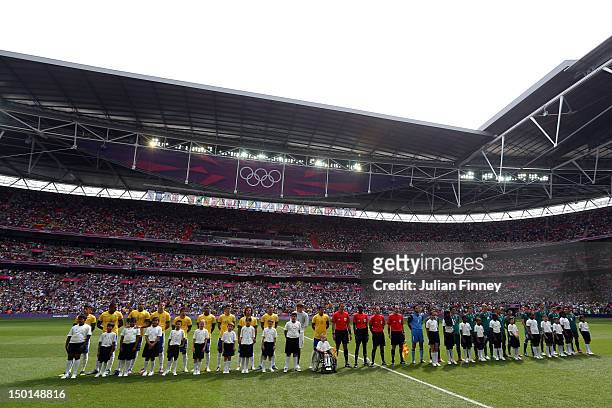 The teams line up ahead of the Men's Football Final between Brazil and Mexico on Day 15 of the London 2012 Olympic Games at Wembley Stadium on August...