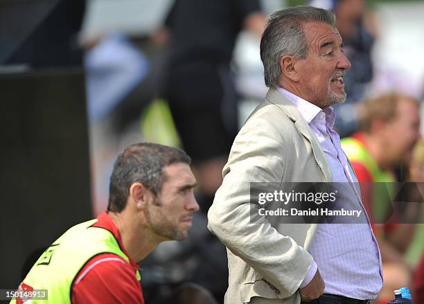 Terry Venables, technical advisor, and Martin Keown of Wembley FC look on during a Budweiser FA Cup Extra Preliminary Round at Vale Farm Stadium, on...