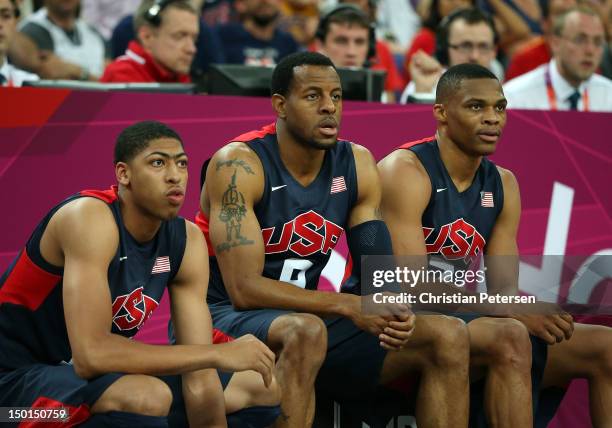 Anthony Davis, Andre Iguodala and Russell Westbrook of United States wait to check in during the Men's Basketball semifinal match against Argentina...