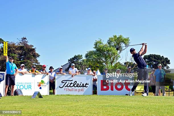 Lee Slattery of England plays his first shot on the 1st hole during Day Four of the Open de Bretagne at Golf Blue Green de Pleneuf Val Andre on June...