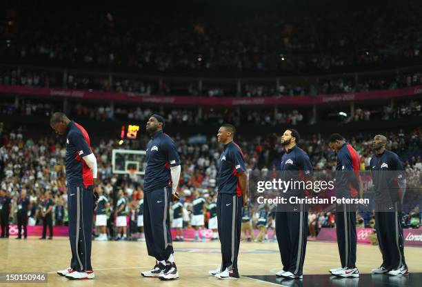 Kevin Durant, Lebron James, Russell Westbrook, Deron Williams, Andre Iguodala and Kobe Bryant of United States line up for National Anthem before the...