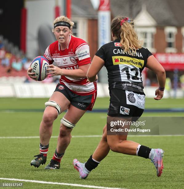 Sam Monaghan of Gloucester-Hartpury takes on Gabby Cantora during the Women's Allianz Premier 15s Final between Gloucester-Hartpury and Exeter Chiefs...
