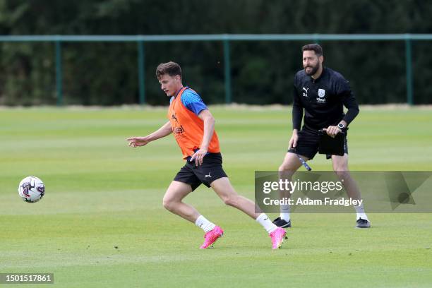 Taylor Gardner-Hickman of West Bromwich Albion and Damia Abella Coach of West Bromwich Albion at West Bromwich Albion Training Ground on July 4, 2023...